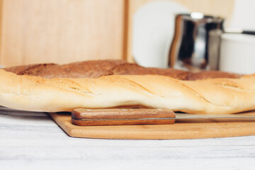 long loaf baked goods cutting board bread