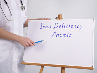 Medical concept meaning Iron Deficiency Anemia with phrase on the page.