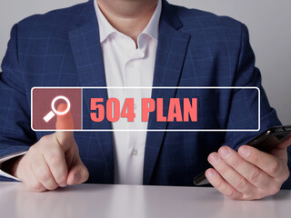  504 PLAN text in search line. Budget analyst looking for something at smartphone. 504 PLAN concept.