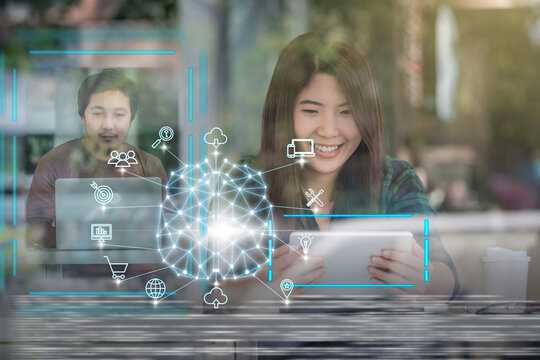 Polygonal brain shape of an artificial intelligence with various icon of smart city Internet of Things Technology over futuristic screen hologram between colleague, AI and business IOT concept