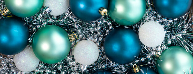 banner with Close up of blue and white Christmas balls. Christmas background. New Year concept.