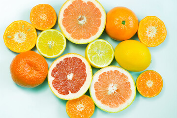Sliced citrus on a white background. Grapefruit, lemon, tangerine.