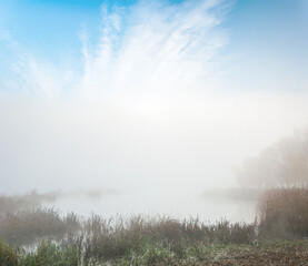 Obraz na płótnie Canvas Mysterious coast in the fog