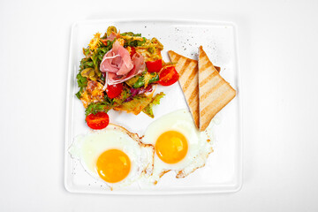 scrambled eggs two toasts and salad