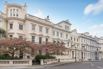 Fototapeta na wymiar Prime London property street. Stanley Gardens in Notting Hill, a popular residential location amongst celebrities and wealthy people