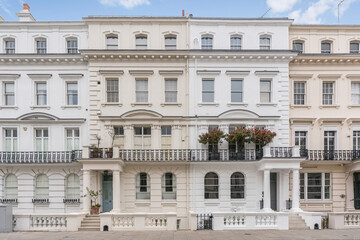 Fototapeta na wymiar Prime London property street. Ilchester Place in Kensington, a popular residential location amongst celebrities and wealthy people