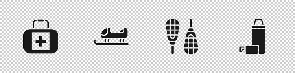 Obraz premium Set First aid kit, Sled, Snowshoes and Thermos container icon. Vector