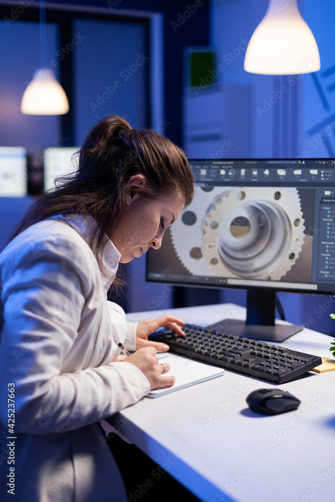 Poster woman engineer architect working in modern cad program sitting at desk in start-up business office. 
