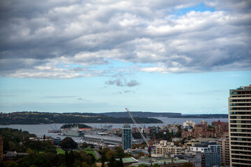 Inner city and harbour, with cloud building in sky, Sydney, Australia
