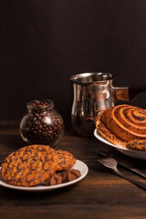 sweet biscuits plates green napkin wooden table coffee