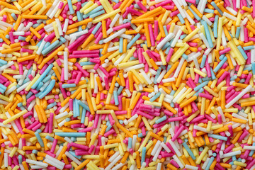 colorful sprinkles background shot from above
