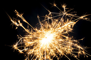 Sparkler burning with dark background. Abstract fire burning background