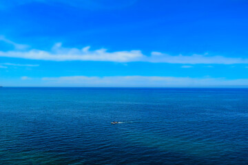 Beautiful view of a wooden boat on open Mediterranean sea 