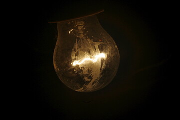 light bulb on black background