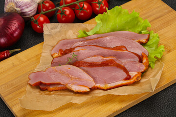 Sliced smoked duck breast served salad