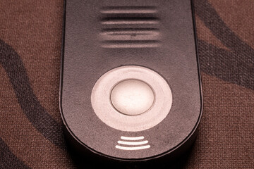 Close up of an unbranded remote control for dslr cameras