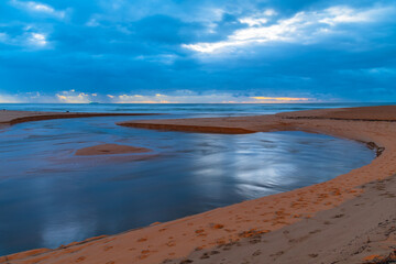 Rainy day sunrise at the lagoon