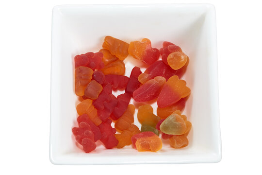 Delicious Gummy Bears In A Square Bowl.