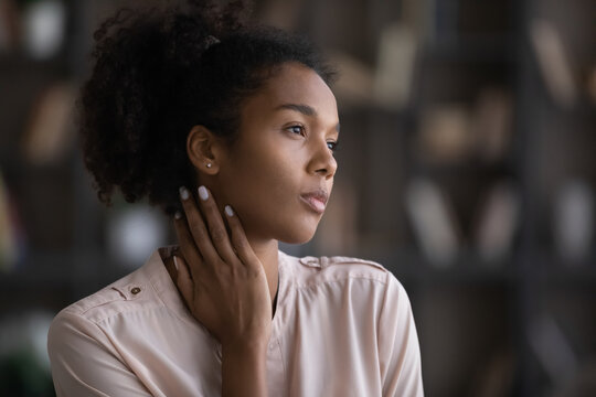 Pensive African American Woman Look In Distance Thinking Dreaming Of Future Success Or Opportunities. Thoughtful Biracial Young Female Imagine Or Visualize. Dreamer, Vision, Visualization Concept.