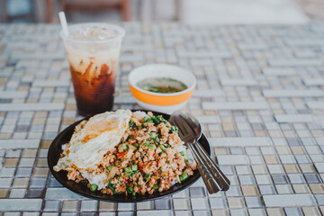 Thai food is Stir Fried Pork with Basil and Eggs with Fish Sauce and chili