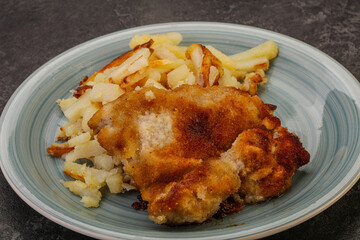 Pork schnitzel with roasted potato
