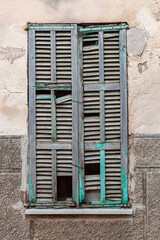old window shutters closed in sa pobla, majorca, spain