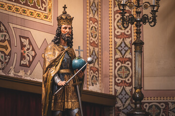 Fototapeta premium Catholic cathedral, Easter celebration with decorations and priests