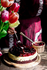 Cherry cheesecake. Not the whole cake is in focus. 