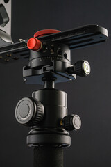 Detail of panoramic head on the dark background for making of virtual tours and panoramic pictures.