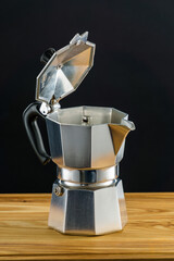 Moka coffeemaker on the dark background.