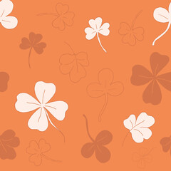 Seamless pattern with clover. The leaves of the clover. Orange pattern. Lots of clover leaves. Vector illustration. Stock vector.