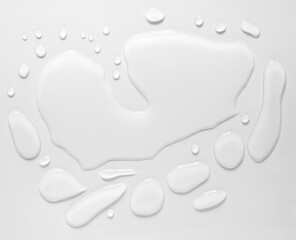 real image, top view spilled water drop on the floor isolated on white background