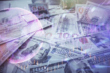 Multi exposure of forex chart drawing over us dollars bill background. Concept of financial success...