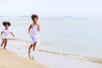 African girl  playing relax enjoy life funny moment on the beach 