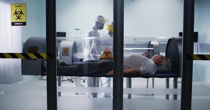 Doctors checking COVID patients in hyberbaric chambers
