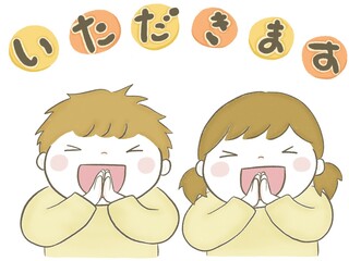 元気良くいただきますのあいさつをする子供
