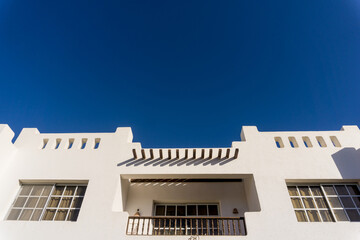 Obraz premium The view of top floor of house in the tropical garden with balcony and roof