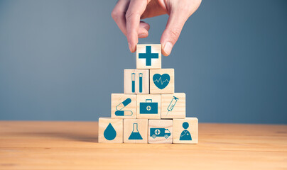 wooden blocks with the health care medical symbol