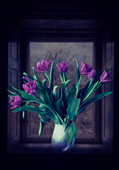 Still life, purple tulip bouquet on the windowsill, with the dim light of a winter landscape outside
