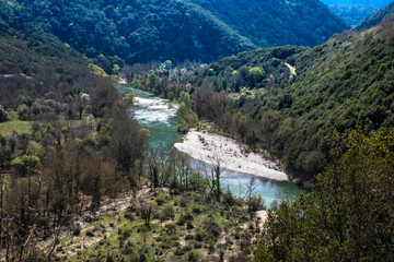 View from the top to the cascades in the jungle. River meandering through forested landscape....