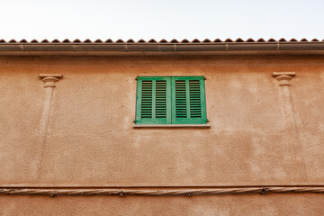 old window with shutters