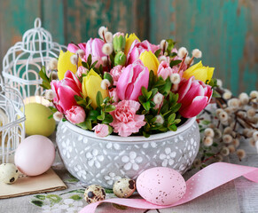 Beautiful floral arrangement with tulip and carnation flowers