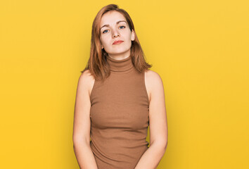 Obraz premium Young caucasian woman wearing casual clothes relaxed with serious expression on face. simple and natural looking at the camera.