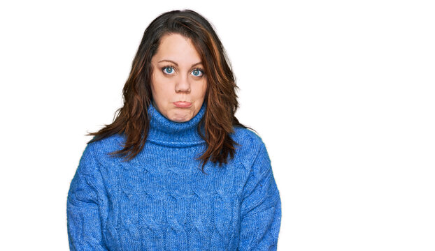 Young plus size woman wearing casual clothes depressed and worry for distress, crying angry and afraid. sad expression.
