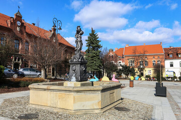 MYSLENICE, POLAND - APRIL 02, 2021: The fountain on the main market square