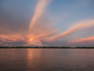 Naklejka na ściany i meble Sunset over the Amazon river