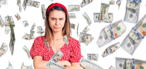 Young beautiful girl wearing dress and diadem skeptic and nervous, disapproving expression on face...