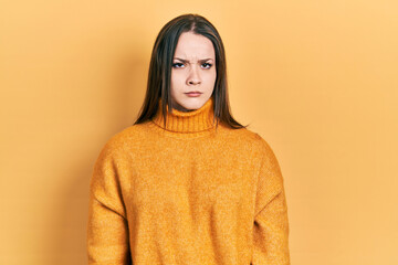 Young hispanic girl wearing casual clothes skeptic and nervous, frowning upset because of problem....