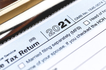 Tax time 2021 with 1040 individual tax form close-up