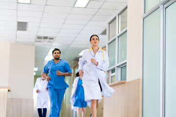 Group of medics or doctors Push Stretcher with Seriously Patient to Operating surgery Room,...